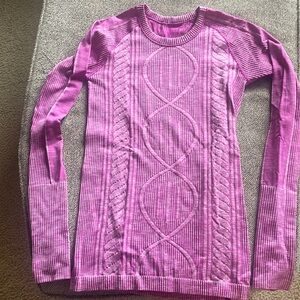 TWO Lululemon shirts. Thicker than swiftly. Has thumb holes. GUC. Size 4.